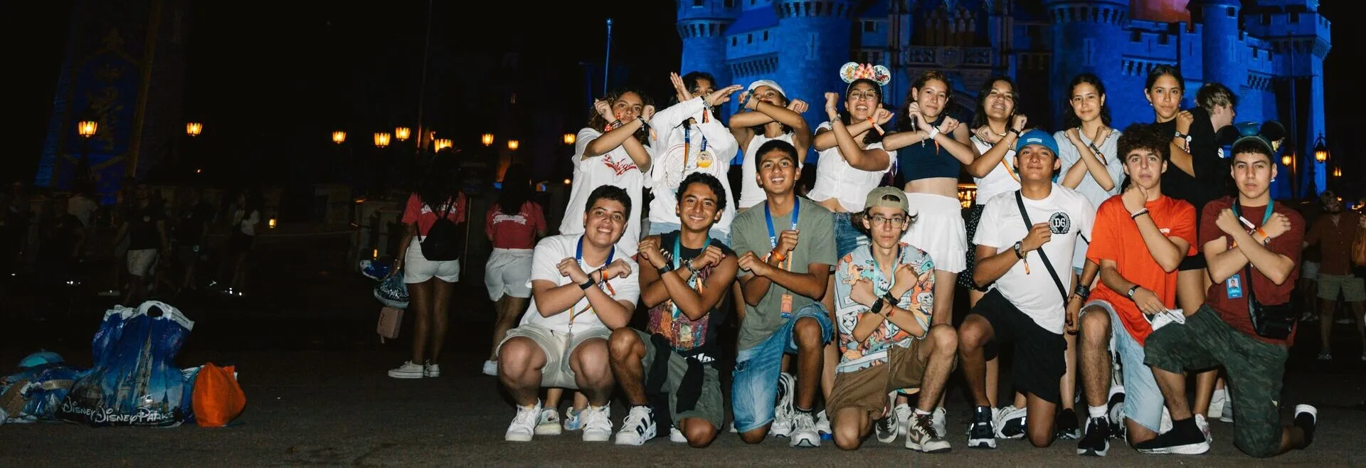 Xcape team with disney castle in the background
